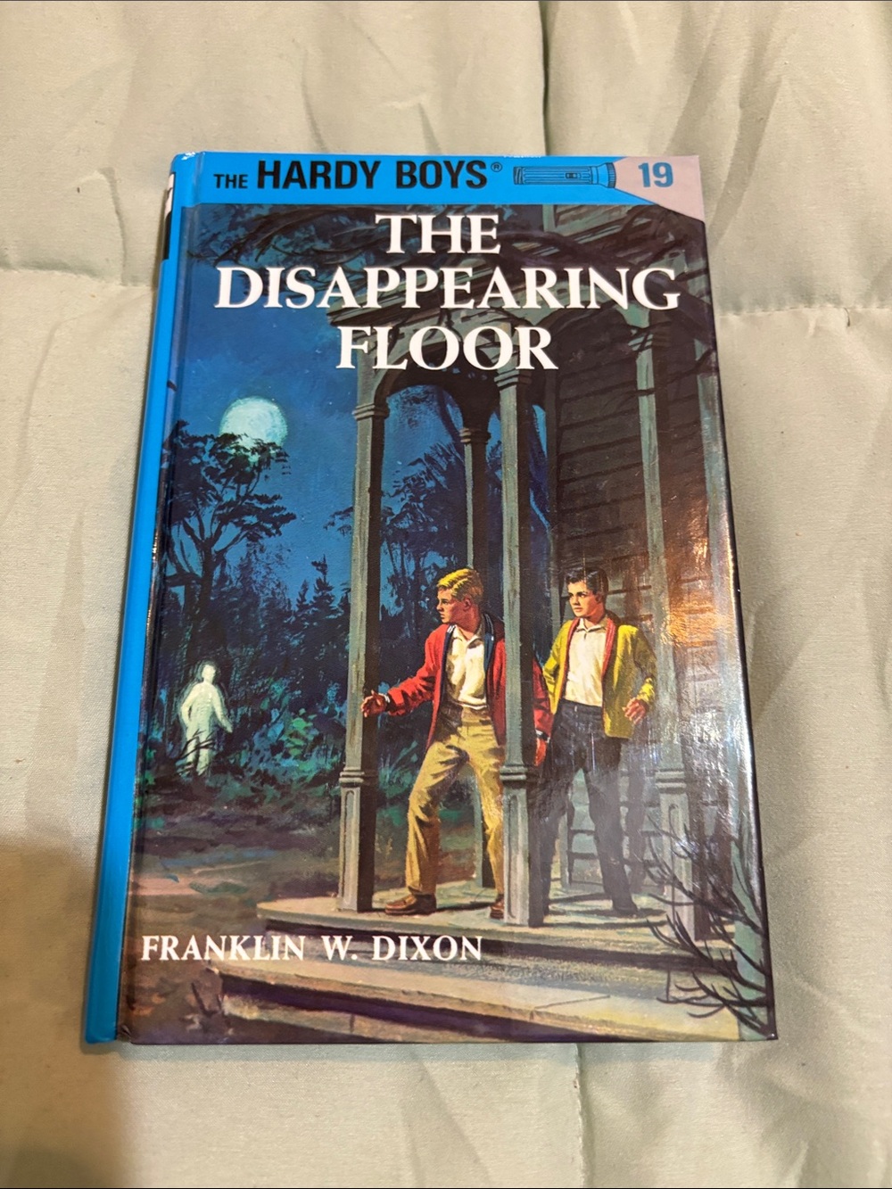 : The Disappearing Floor - Franklin W. Dixon (Blue Cover) #19. Like new!